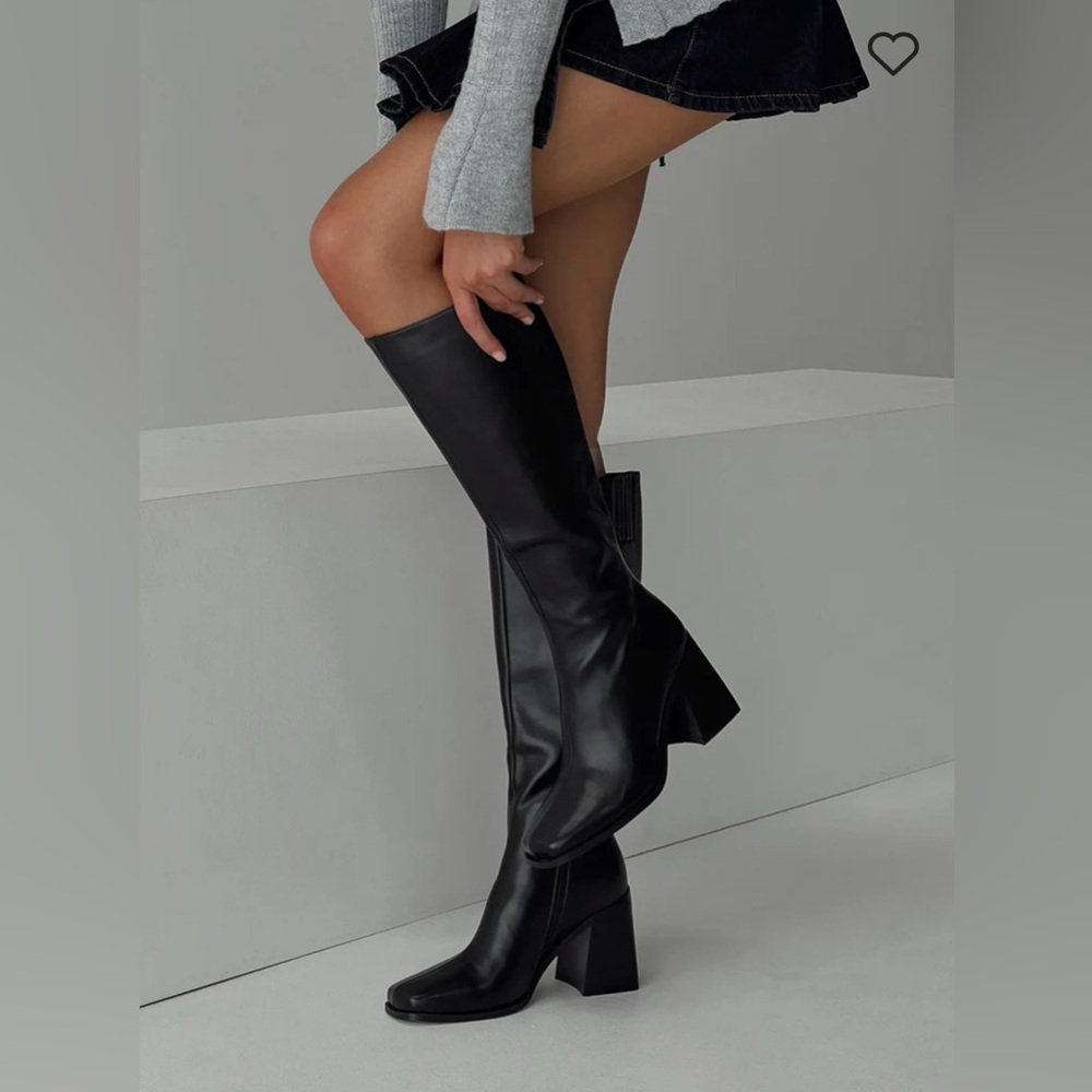 Princess Polly black knee high boots.